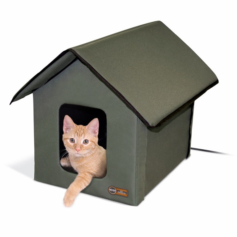 K&H Outdoor Heated Kitty House in olive with a cat inside