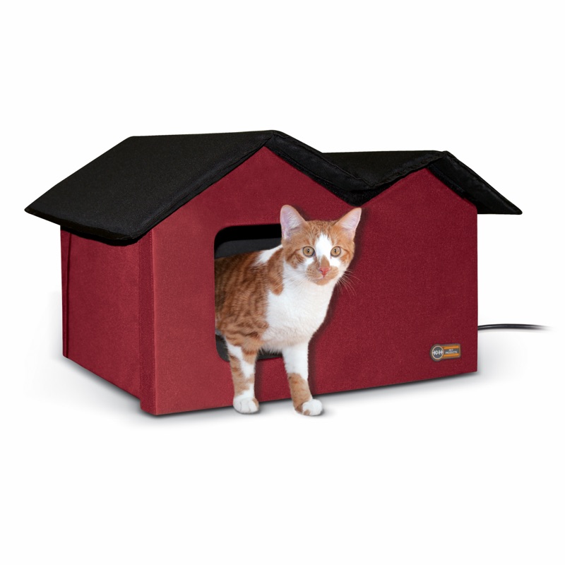 K&H Outdoor Heated Kitty House Extra-Wide in barn red and black with a cat at the door